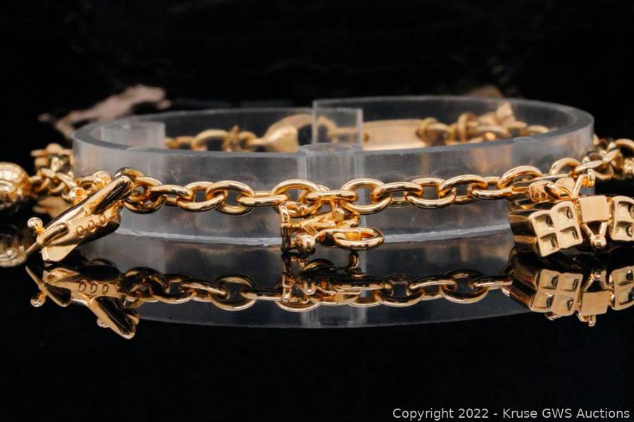 Cartier - CARTIER 18K YELLOW GOLD 7 CHARMS BRACELET
