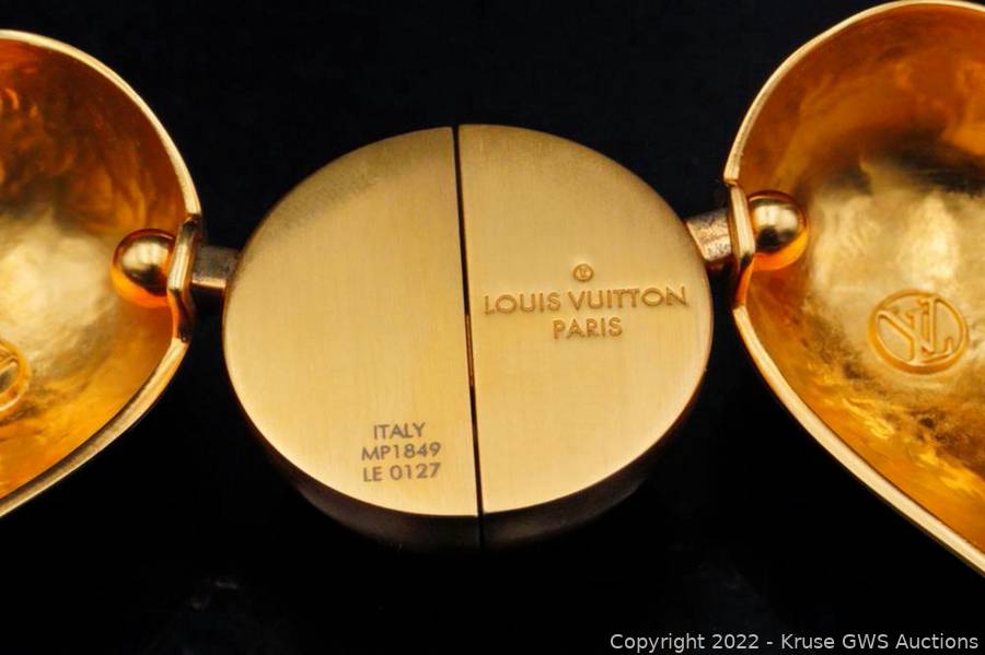 Sold at Auction: Louis Vuitton Gold Toned Earrings
