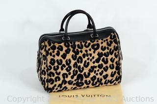 At Auction: LOUIS VUITTON Handbag LEOPARD SPEEDY BAG 30.