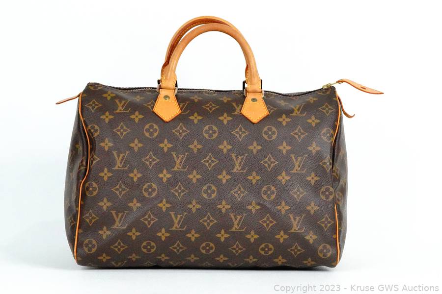 Sold at Auction: AUTHENTIC LOUIS VUITTON SPEEDY 35 MONOGRAＭOUFLAGE CANVAS,  LEATHER HAND BAG