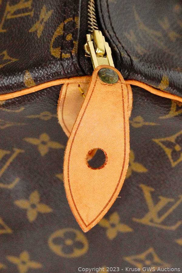 Sold at Auction: AUTHENTIC LOUIS VUITTON SPEEDY 35 MONOGRAＭOUFLAGE CANVAS,  LEATHER HAND BAG