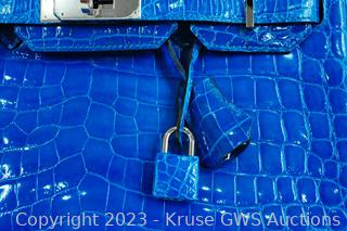 Sold at Auction: Hermes Blue Shiny Niloticus Crocodile Birkin 30