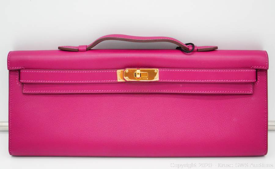 Sold at Auction: Hermes Fuchsia Pink Swift Leather Kelly Cut Pochette