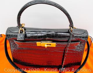 Sold at auction Brown Lizard Kelly Pochette Handbag, Hermes Auction  Number 2801T Lot Number 1040