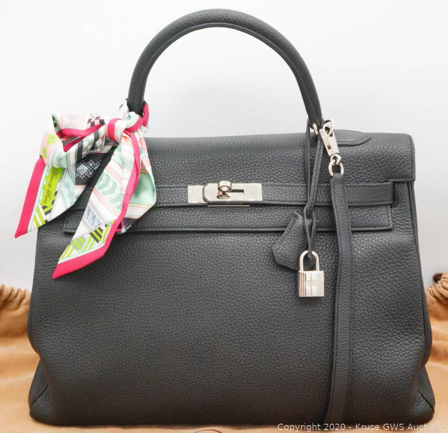 Sold at Auction: Hermes 35cm Cream Leather Kelly Retourne Bag