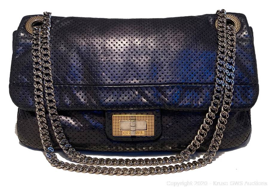 Sold at Auction: Chanel Black Leather Perforated Drill Flap Bag