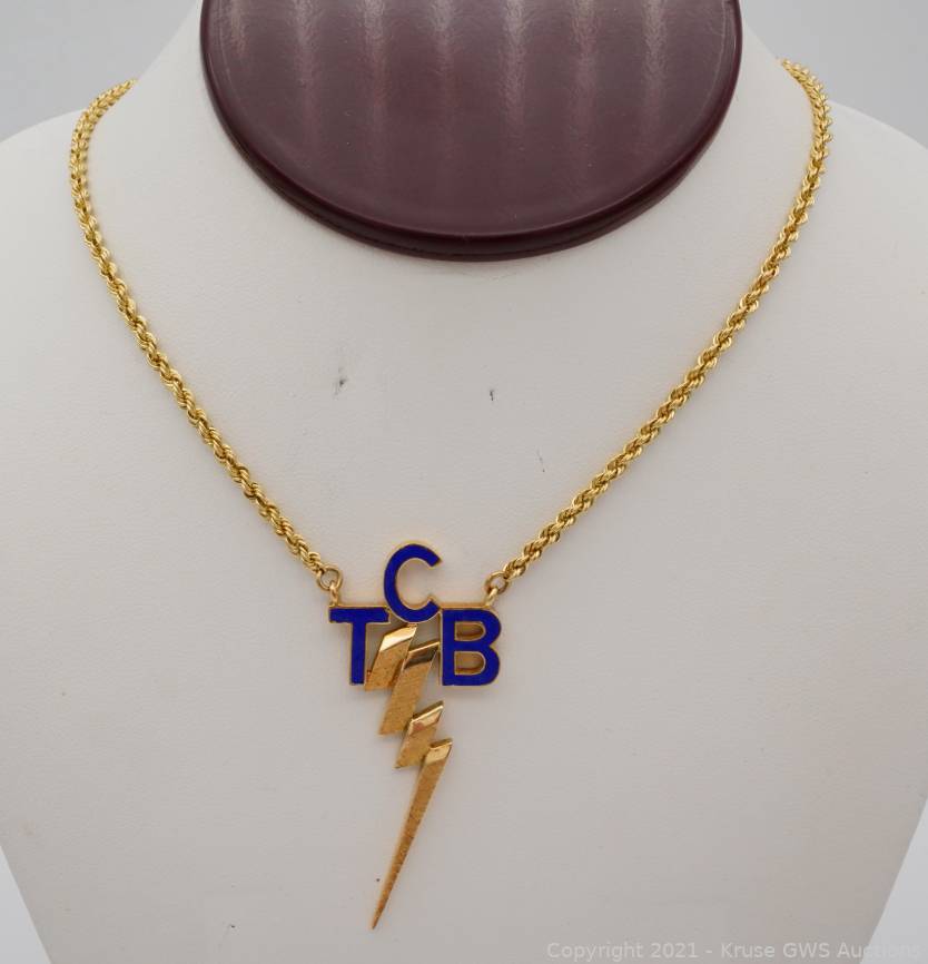 Elvis Presley & Blue Enamel TCB Necklace Auction | Auctions