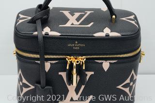 Louis Vuitton Black And Beige Giant Monogram Empreinte Cosmetic Pouch PM  Gold Hardware, 2022 Available For Immediate Sale At Sotheby's