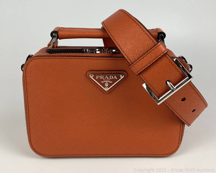 Shop PRADA Small Saffiano leather Prada Brique bag by Caterina